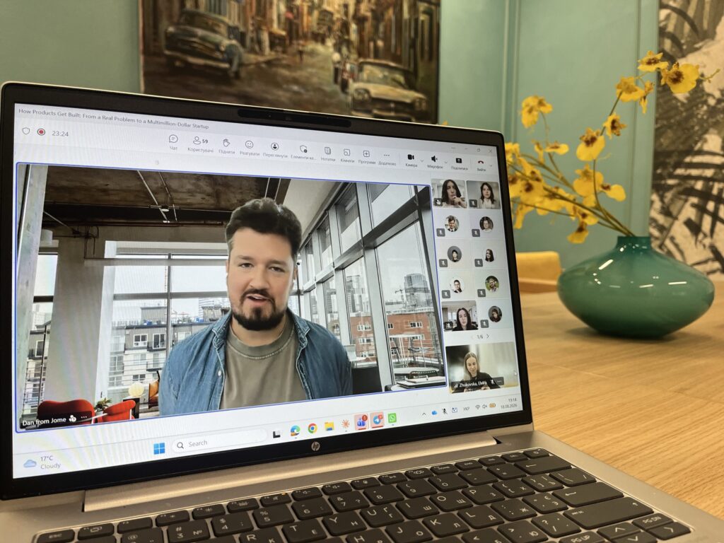 Dan Hnatkovskyy, co-founder of Jome, speaking on a video call shown on a laptop screen